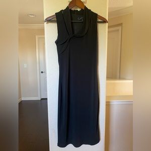 Rachel Roy black dress. Stretchy material, size small. Never worn.